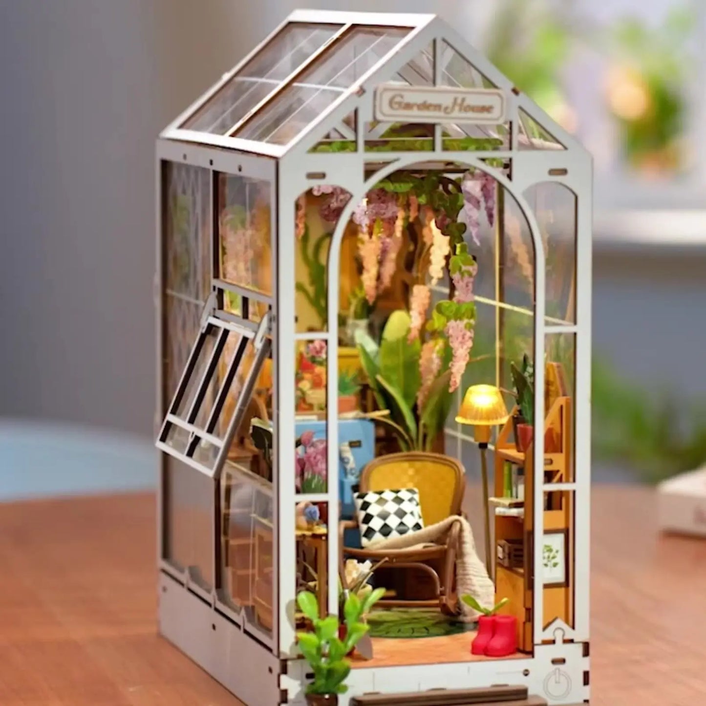 Cozy Garden House Book Nook on a wooden table