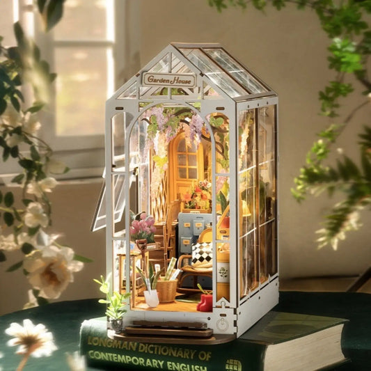 Garden House Book Nook with beautiful floral decor on a dictionary