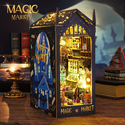 Front view of Magic Market book nook illuminated, showcasing the detailed interior design